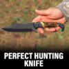 Person holding handmade carbon steel hunting knife with fire bone handle outdoors