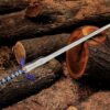 Hand forged Zelda Master Sword replica displayed outdoors