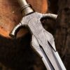 Close-up of handmade fantasy sword blade and guard