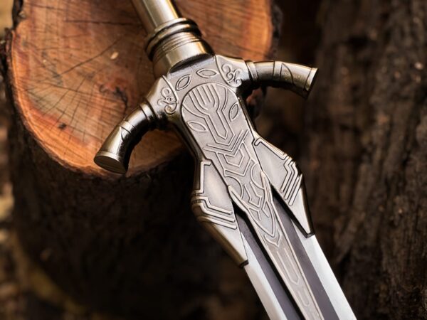 Close-up of handmade fantasy sword blade and guard