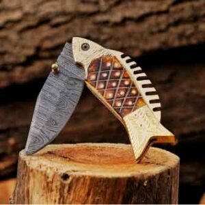 Camel bone handle Damascus folding pocket knife displayed on a wooden stump