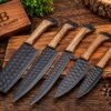 Five piece handmade kitchen knife set with black powder coated blades and Ash Wood handles