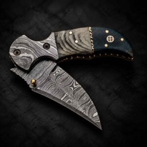 Custom Engraved Pocket Knife displayed on a dark background with detailed handle and patterned blade
